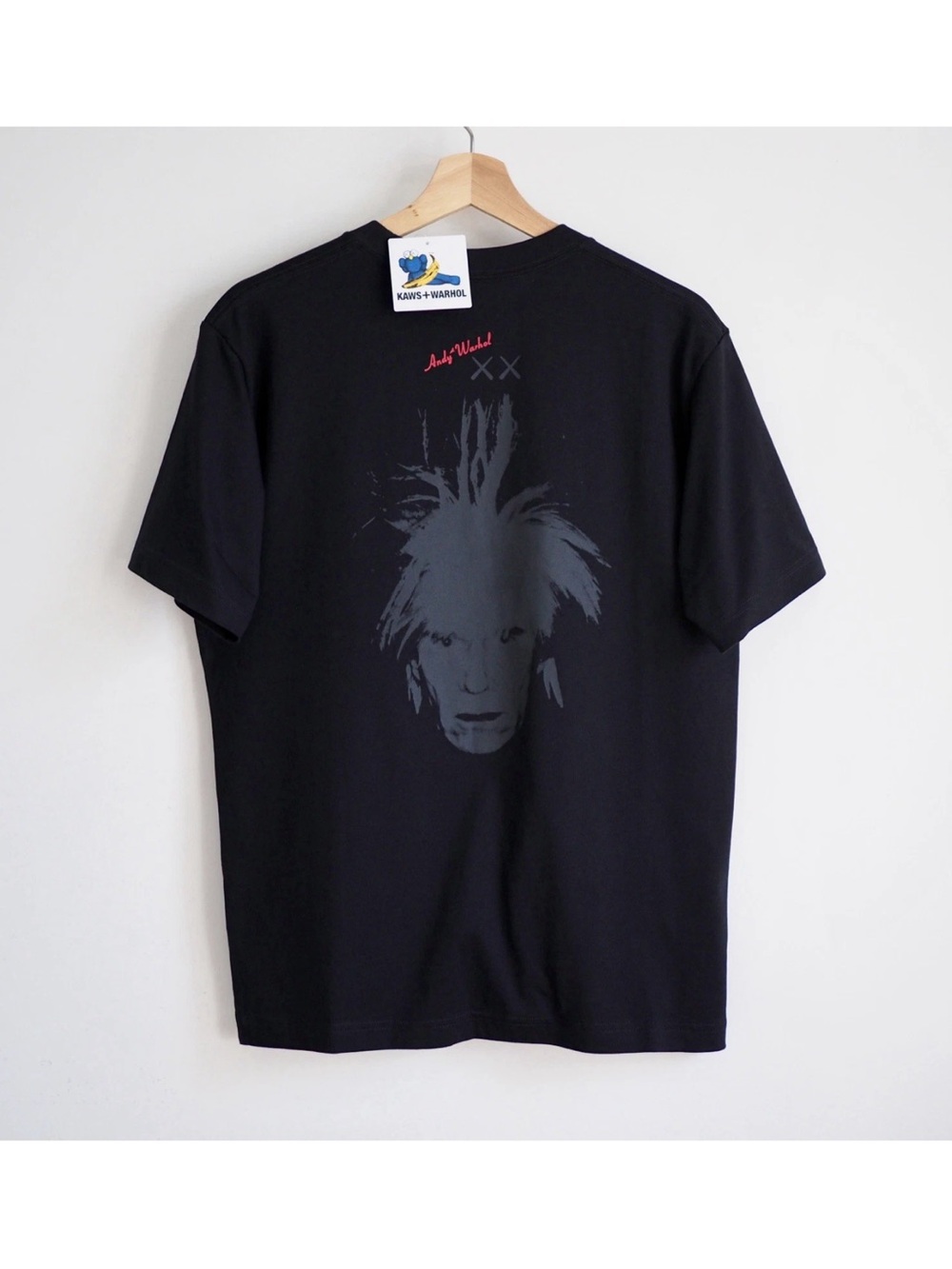 Uniqlo x KAWS Black Tee with Gray Portrait and Red Signature